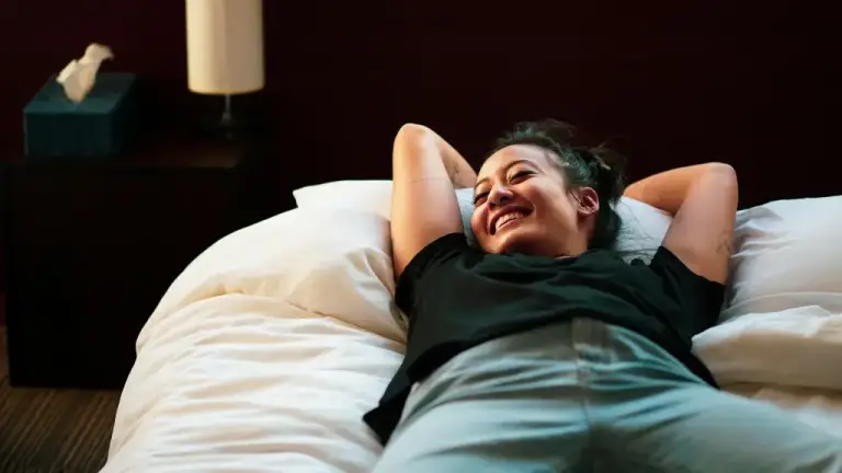 Happy person on bed